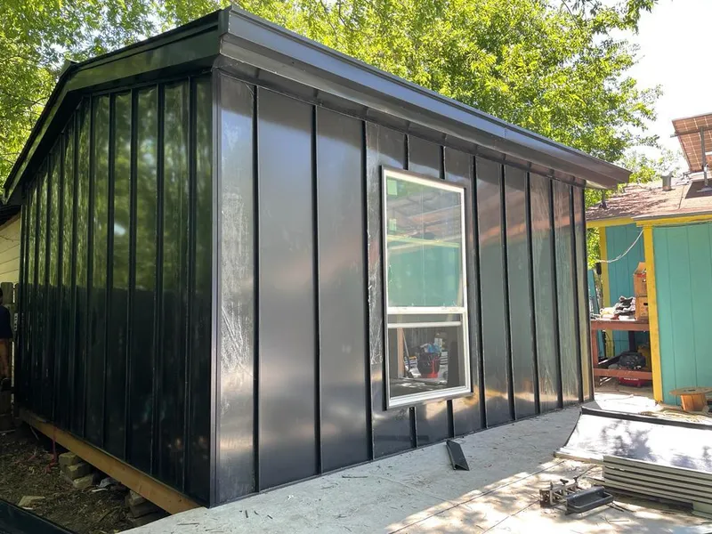 Black standing seam metal wall panels for Metal Roof Installation in Elk City