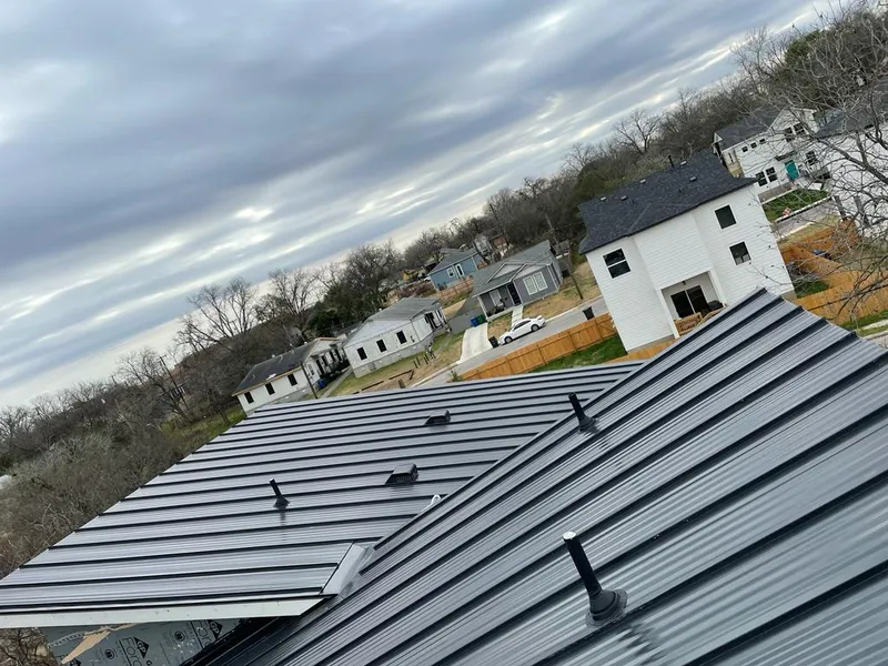 Standing seam metal roof panels with vents for Skylight Repair in Elk City